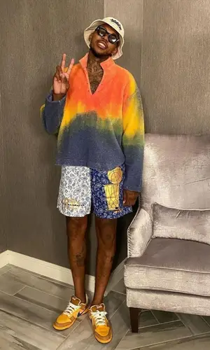 Nick Young wearing Cactus Plant Flea Market sweatshirt