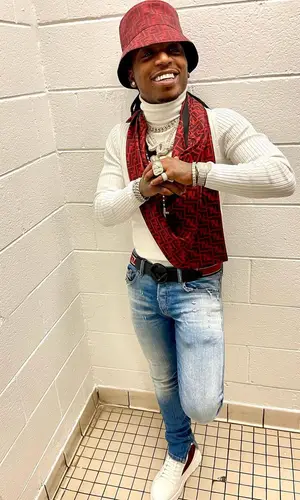 Jacquees wearing Fendi scarf