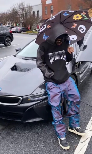 Lil Gnar wearing Louis Vuitton eyewear