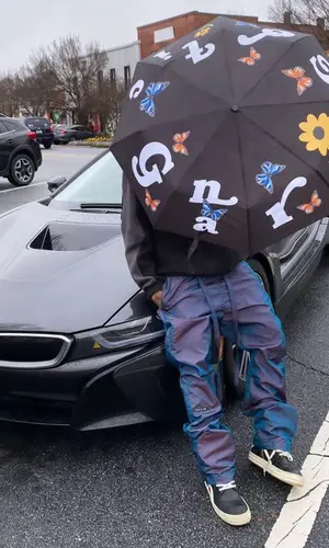 Lil Gnar wearing Unwanted Collection hoody