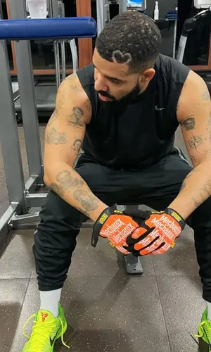 Drake wearing Mechanix glov