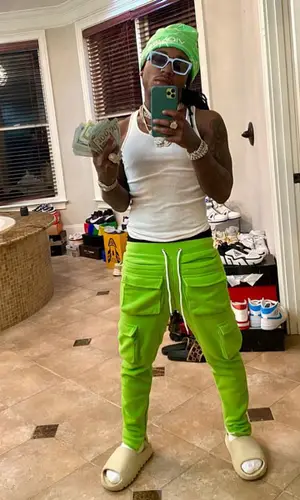 Jacquees wearing Yeezy sandal
