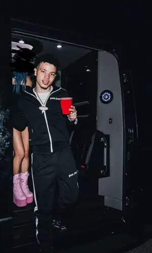 Lil Mosey wearing Palm Angels pants