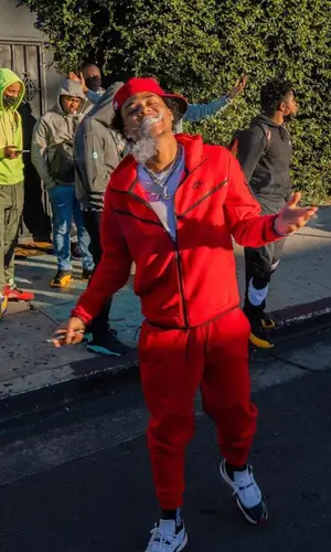 Luh Kel wearing Nike hoody