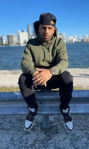 Nicky Jam wearing Nike hoody