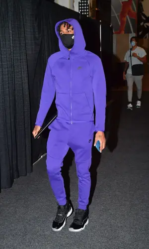 Ja Morant wearing Nike pants