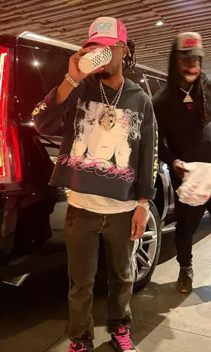 Metro Boomin wearing Chrome Hearts jeans