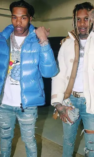 Lil Durk wearing Gucci boots