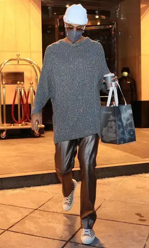 Kyle Kuzma wearing Raf Simons sweater