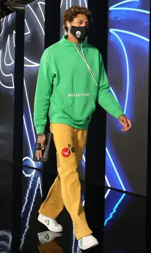 Kelly Oubre Jr wearing Converse hoody