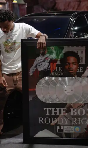 Roddy Ricch wearing Casablanca t-shirt