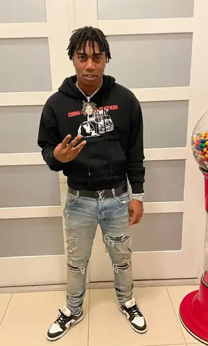 Fredo Bang wearing Louis Vuitton belt