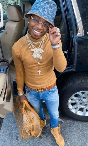 Jacquees wearing Gucci sweater