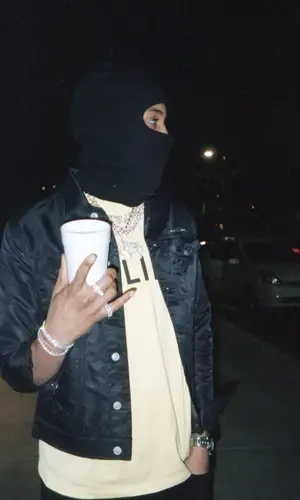 G Herbo wearing Alexander McQueen boots