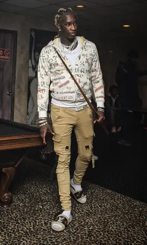 Young Thug wearing Ricchezza Forever hoody