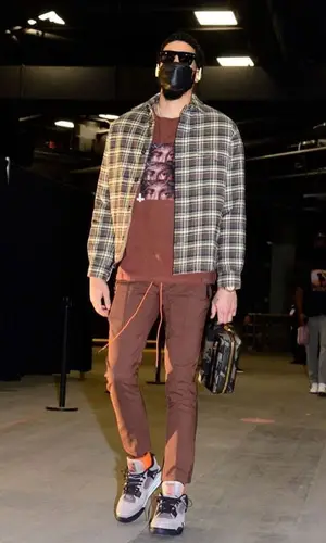 Jayson Tatum wearing Christos trousers