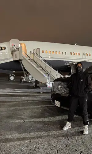 The Weeknd wearing Nike pants