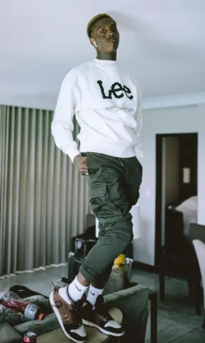 Famous Dex wearing H&M sweatshirt
