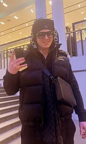 Yung Trappa wearing Louis Vuitton scarf
