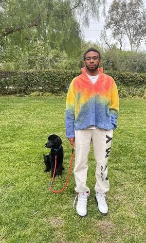 Kevin Abstract wearing Cactus Plant Flea Market sweatshirt