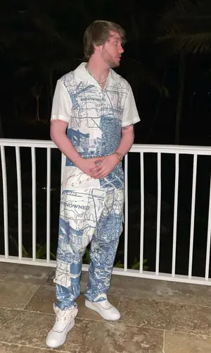 Murda Beatz wearing Renowned LA shirt