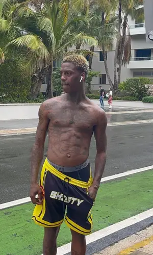 Famous Dex wearing Yeezy sandal