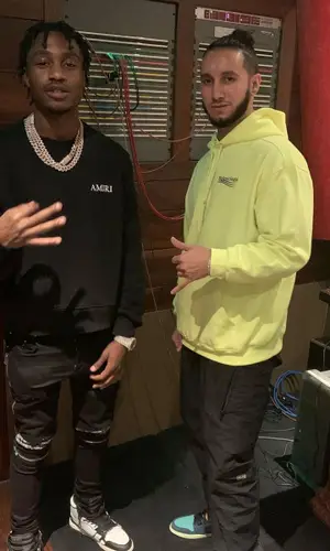 Lil Tjay wearing Amiri sweatshirt