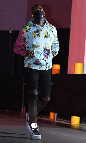 John Wall wearing Louis Vuitton hoody