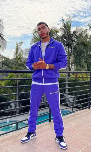 CJ wearing Palm Angels jacket