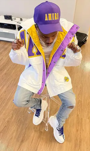 DaBaby wearing Alexander McQueen boots