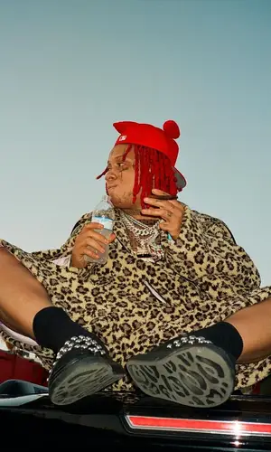 Trippie Redd wearing Shyne Boys hat