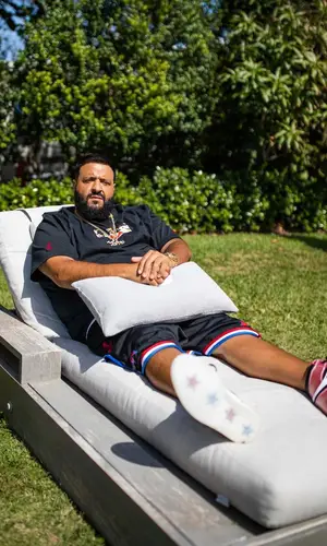 DJ Khaled wearing Louis Vuitton backpack