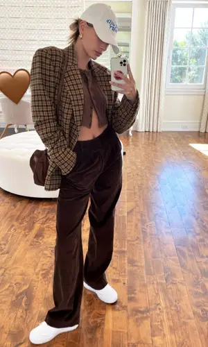 Hailey Bieber wearing Justin Bieber Merch cap