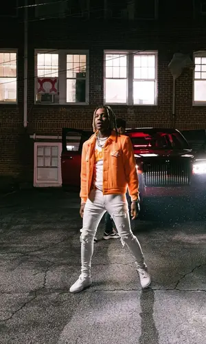 Lil Durk wearing Louis Vuitton belt