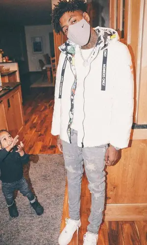 NBA YoungBoy wearing Members Only jacket