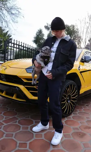 The Kid Laroi’s Outfit in Palm Angels T-Shirt, Fuck The Population Pants & Vans Cap (2021)