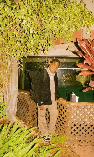 Don Toliver wearing Needles pants
