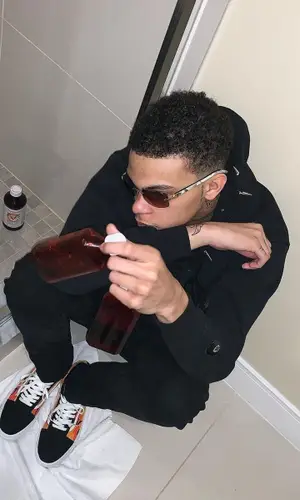 D Savage wearing Section 8 hoody