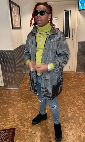 Lil Gotit wearing War sweater