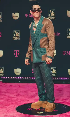 Lenny Tavarez wearing Fendi pants
