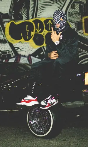 NLE Choppa wearing Karl Kani sock