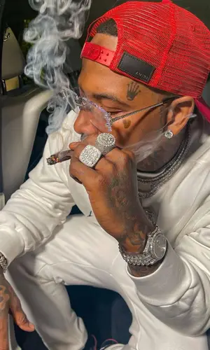 Moneybagg Yo wearing Amiri sweatshirt