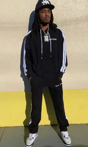 Quavo wearing Chrome Hearts cap