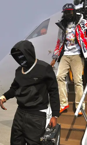 Bobby Shmurda wearing Prada pants