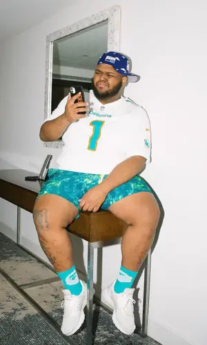 Druski wearing Nike jersey