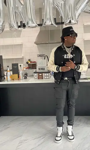 Gunna wearing Dior belt