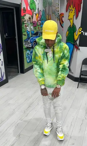 Rylo Rodriguez wearing Palm Angels sweatshirt