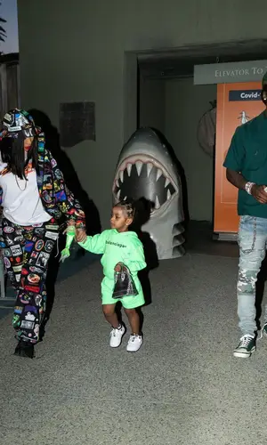 Cardi B wearing Supreme jacket