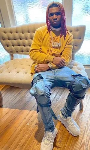 Lil Keed wearing Lover Boy New York sweatshirt