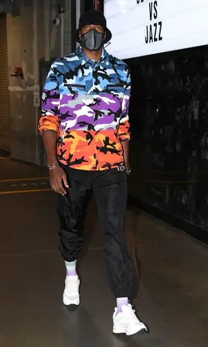 Serge Ibaka wearing Valentino pants